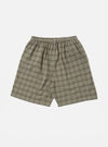 The Green PJ Plaid Pyjama Short on a white background. The shorts are a loose fit with an elastic waistband and a green and brown plaid pattern.