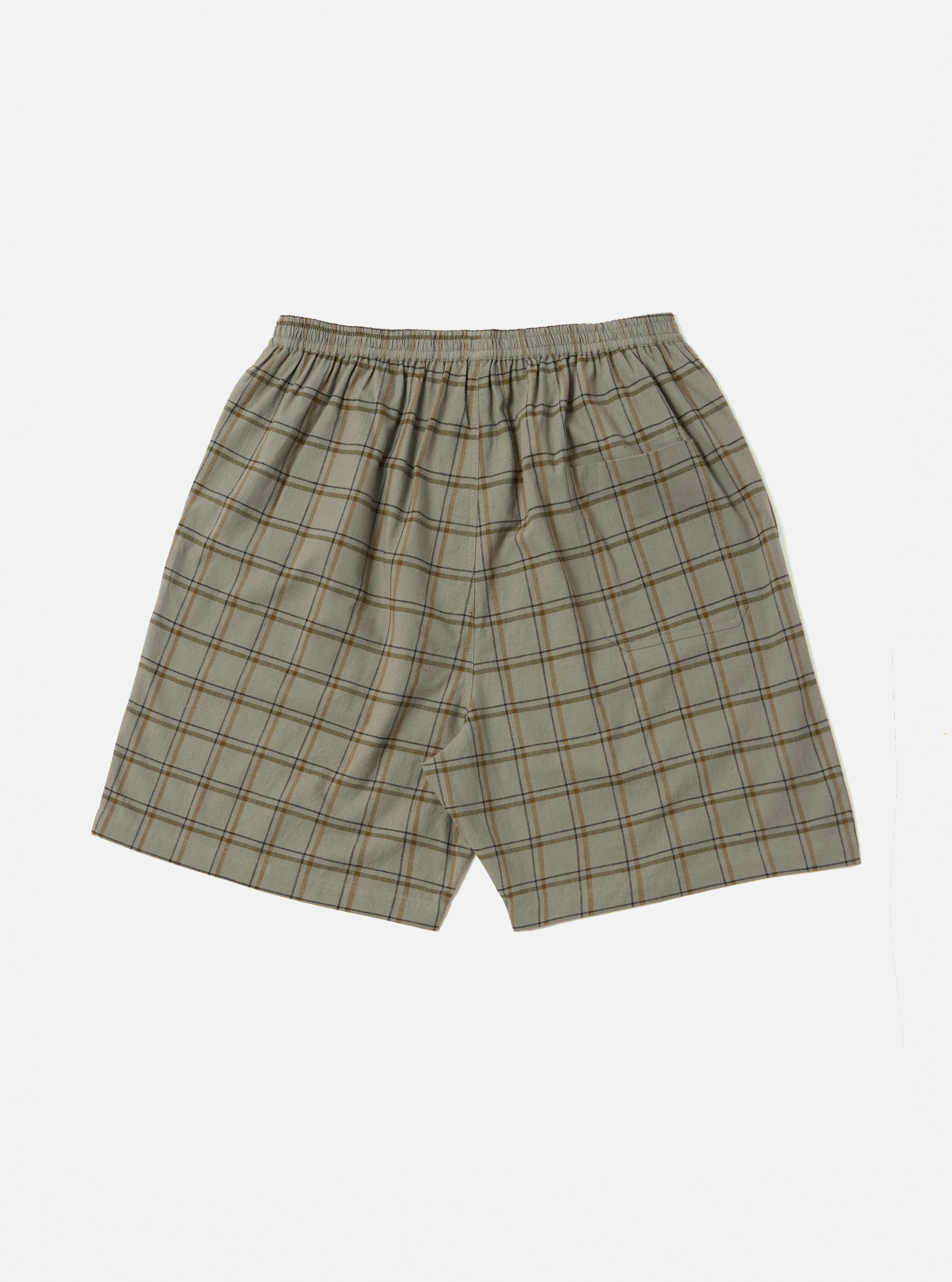 The Green PJ Plaid Pyjama Short on a white background. The shorts are a loose fit with an elastic waistband and a green and brown plaid pattern.