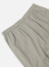 Close-up of the Green Tiny Check Pyjama Pant, showcasing its elastic waistband and soft, checkered fabric on a clean, white background.