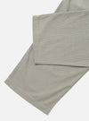 Close-up of the Green Tiny Check Pyjama Pant on a white background. The fabric has a small green and white check pattern.