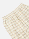 Close-up of the Ecru PJ Plaid Pyjama Pant on a white background. The plaid pattern features ecru with brown and gray lines. Elastic waistband detail.