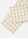 Close-up of the Ecru PJ Plaid Pyjama Pant on a white background. The fabric is ecru with a gold and gray plaid pattern. Soft and comfortable.