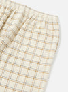 Close-up of the Ecru PJ Plaid Pyjama Pant on a white background. The pants feature an elastic waistband and a plaid pattern in ecru, brown, and black.