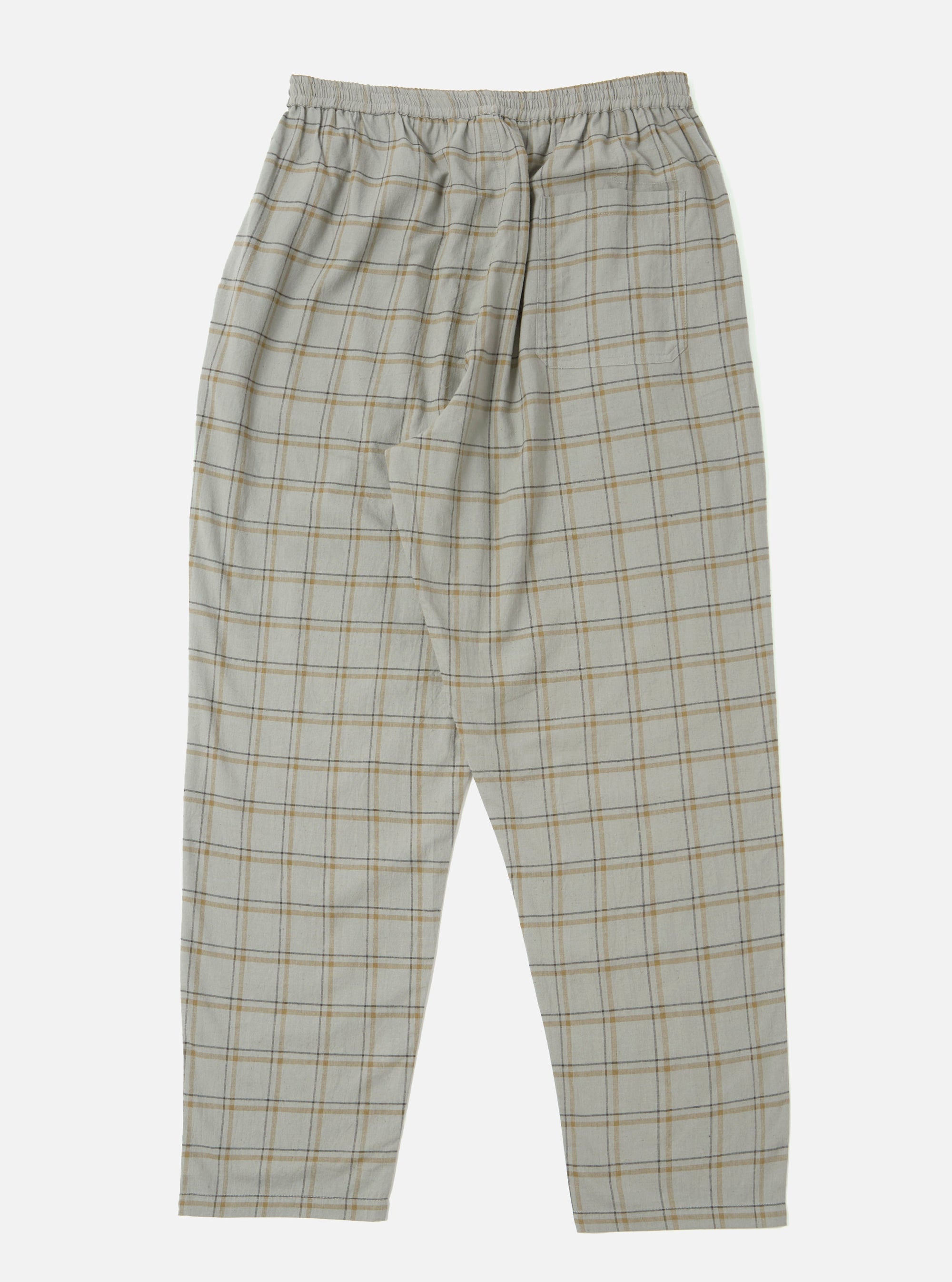 The Green PJ Plaid Pyjama Pant, displayed on a white background. The pants are a loose fit, with an elastic waistband and a plaid pattern in shades of green, gray, and yellow.
