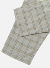 Close-up of the Green PJ Plaid Pyjama Pant on a white background. The plaid pattern features green, gold, and gray lines. The fabric appears soft and comfortable.
