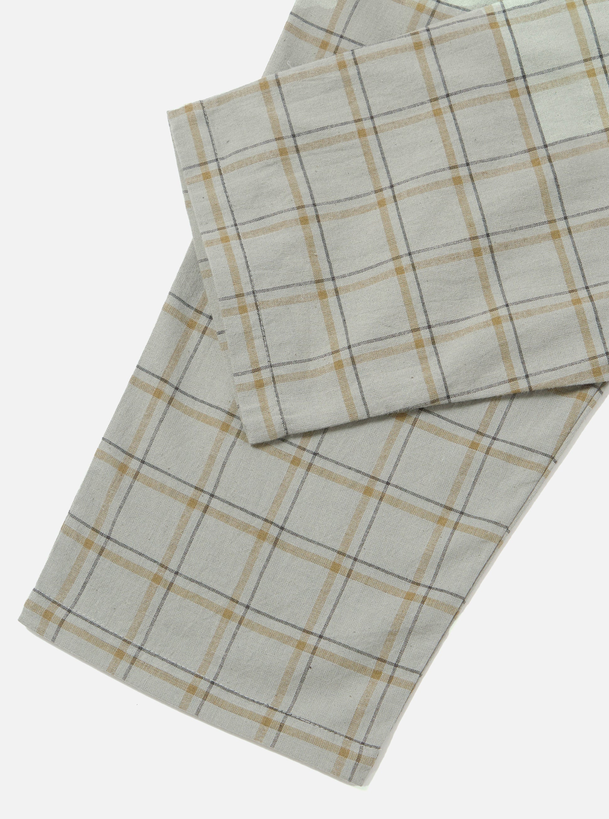 Close-up of the Green PJ Plaid Pyjama Pant on a white background. The plaid pattern features green, gold, and gray lines. The fabric appears soft and comfortable.