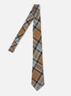 The Brown Ikat Twill Check Tie is displayed on a white background. The tie features a brown, black, white, and red plaid pattern.