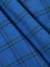 Close-up of the blue plaid fabric of the Navy PJ Plaid Boxer Short. The material is folded, showing the texture and pattern of the fabric.