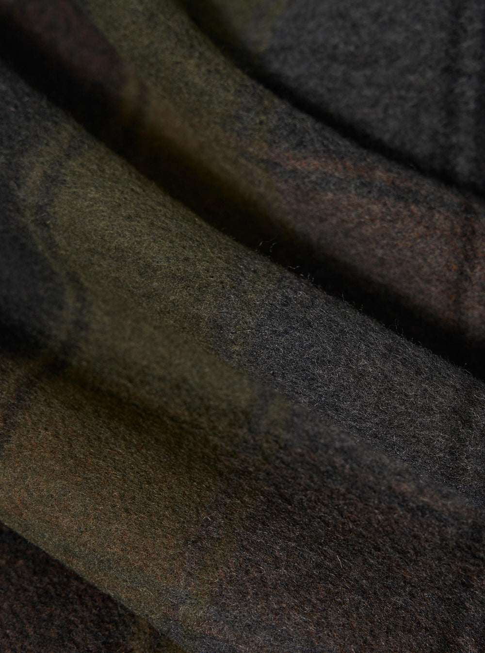 Close-up of the Black/Brown Berlin Wool Check Wayfarer Jacket, showcasing the texture and pattern of the wool fabric.