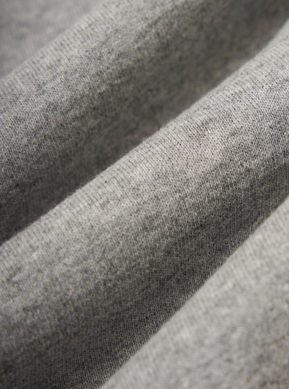 Close-up of the Grey Marl Recycled Cotton Blend Jersey Tyler Jacket, showcasing the soft texture and subtle color variations of the fabric.