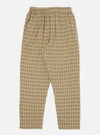 The Sand Picnic Plaid Pyjama Pant, displayed on a white background. The pants are a loose fit, with a beige, brown, and white plaid pattern and an elastic waistband.