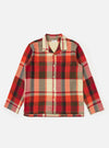The Red Earth Check Long Pyjama Set top, featuring a red, orange, and beige plaid pattern, is laid flat on a white background.