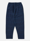 The Indigo Plaid Long Pyjama Set pants laid flat on a white background. The pants are a blue plaid pattern with an elastic waistband.