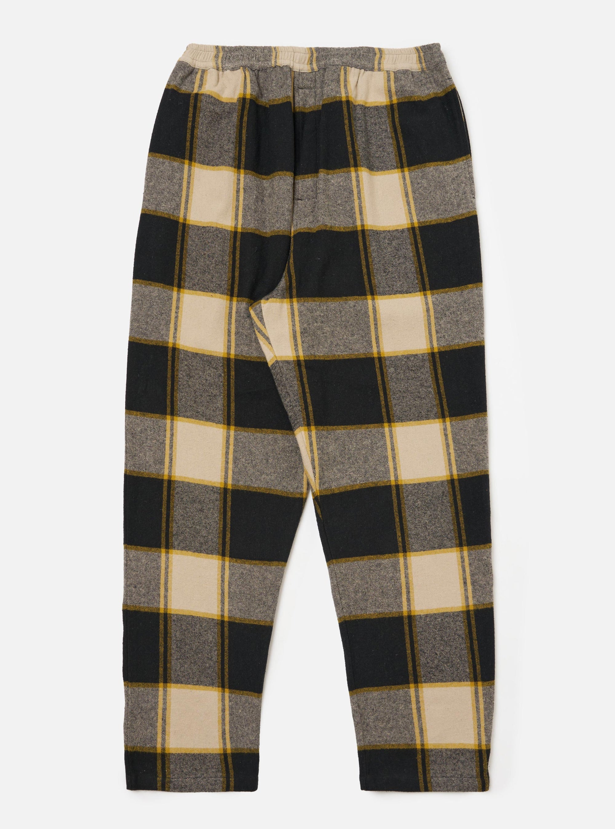 Close-up of the Black/Sand Brushed Big Check Long Pyjama Set pants on a white background. The brushed fabric features a large black, sand, and yellow check pattern.