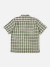 Back view of the Green Busy Plaid Short Pyjama Set top, laid flat on a white background. The shirt is a green, white, and black plaid.