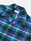 Close-up of the Blue Night Check Short Pyjama Set. The set features a blue, green, and black plaid pattern. The fabric is soft and comfortable, perfect for a good night's sleep.