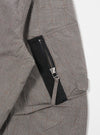 The Grey Brown Wales Glen Check NS Bomber Jacket is shown from the back as a flat lay against a white background. The jacket features a prominent glen check pattern in shades of grey and brown, with a ribbed collar, ribbed cuffs, and a ribbed hem.