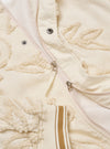 The Ecru 3D Flower NS Bomber Jacket is shown from the back as a flat lay against a plain white background. The jacket features an all-over intricate 3D floral texture in an ecru shade, with ribbed detailing at the collar, cuffs, and hem.