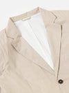 The Brown Kennedy Stripe Boston Blazer is shown from the back as a flat lay against a plain white background. The image highlights the vertical brown and white Kennedy stripe pattern, a central vent at the hem, and the clean construction of the shoulders and sleeves.