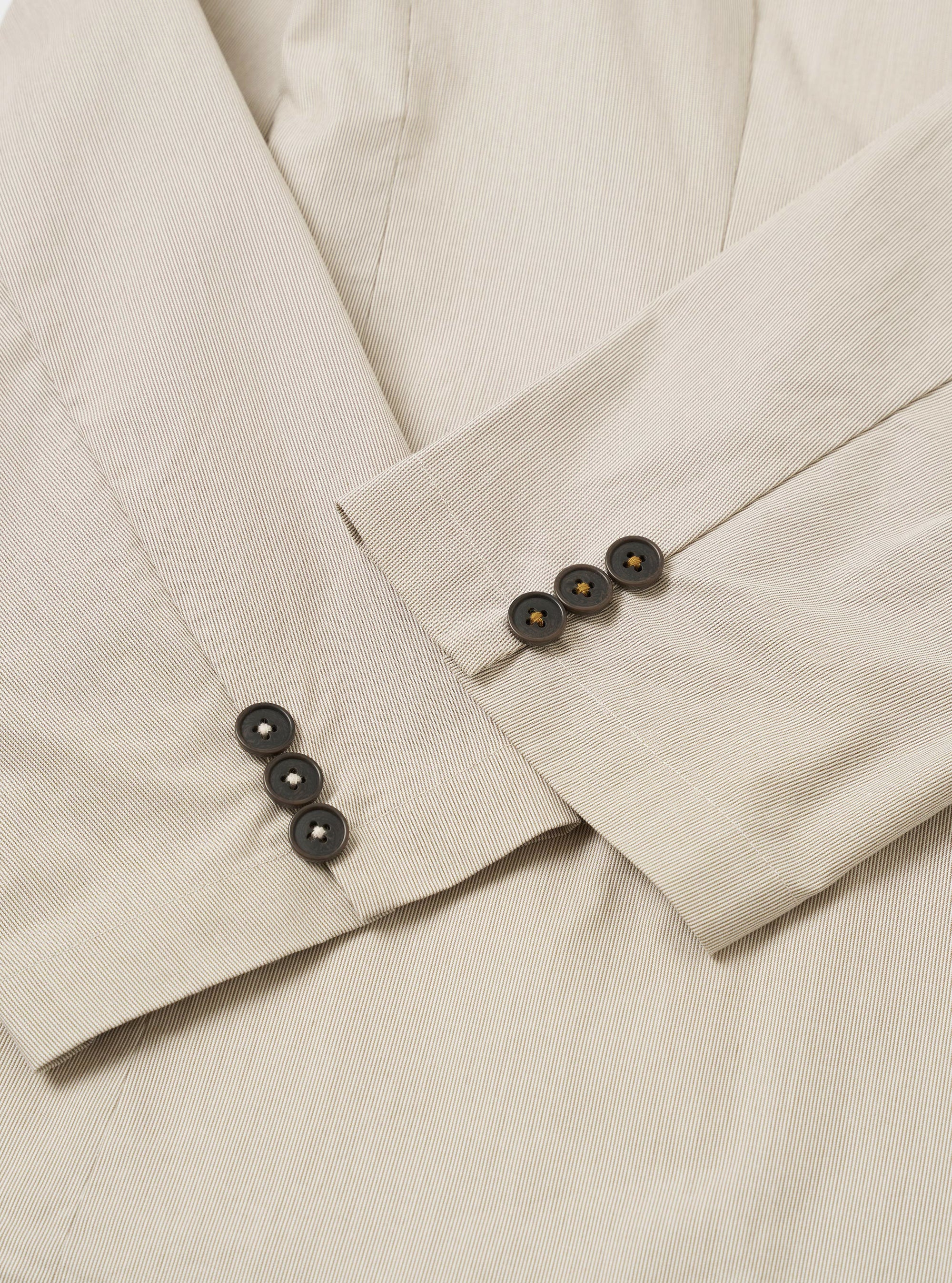 The Brown Kennedy Stripe Boston Blazer is shown from the back as a flat lay against a plain white background. The image highlights the vertical stripe pattern, the straight hem, and the clean construction of the shoulders and sleeves.