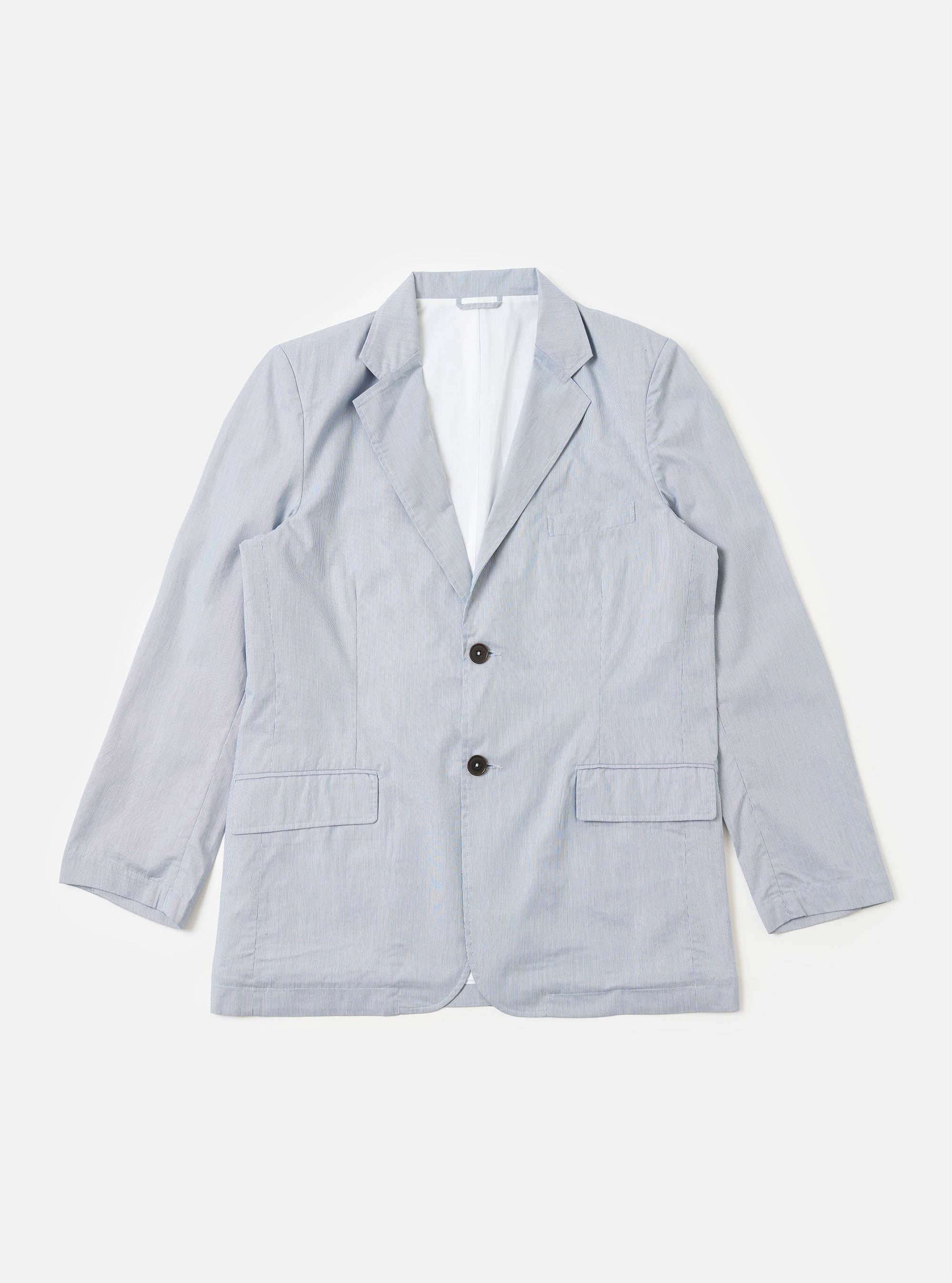 The Navy Kennedy Stripe Boston Blazer is shown as a flat lay against a plain white background. This two-button jacket features a subtle vertical pinstripe pattern on a navy blue base. The garment is designed with a notched lapel, two hip flap pockets, and a single welt pocket on the chest. The structured shoulders and buttoned cuffs are clearly visible.