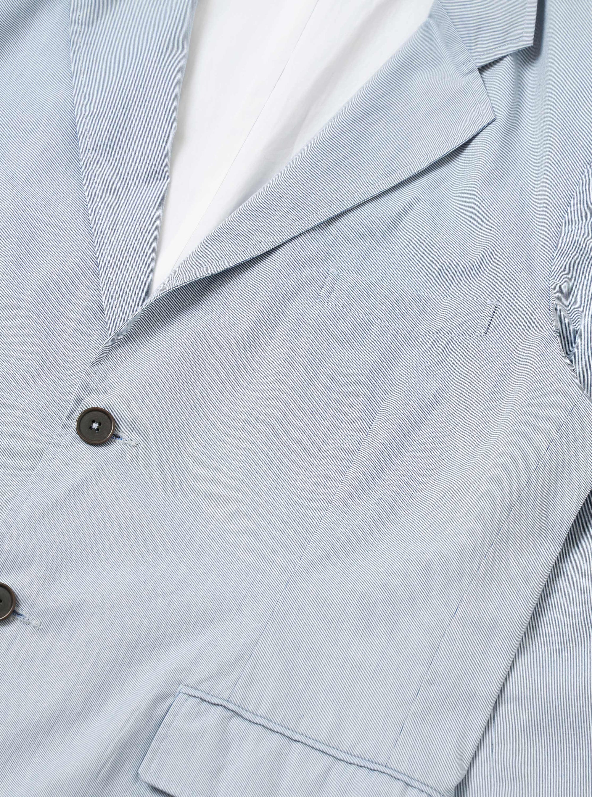 The Navy Kennedy Stripe Boston Blazer is shown from the back as a flat lay against a plain white background. The image highlights the vertical navy and white stripes, the straight hem, and the clean construction of the shoulders and back panel.