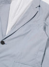 The Navy Kennedy Stripe Boston Blazer is shown as a flat lay against a white background. The blazer features a vertical navy and white stripe pattern, a notched lapel, a three-button front closure, and three patch pockets on the front.