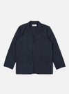 The Navy Recycled Polytech Capitol Jacket is shown as a flat lay against a plain white background. The jacket features a notched lapel, a three-button front closure, a single chest pocket, and two large patch pockets at the waist. The fabric is a deep navy blue with a smooth finish.