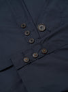 The Navy Recycled Polytech Capitol Jacket is shown from the back as a flat lay against a white background. This unstructured blazer features a single back vent, long sleeves with functioning button cuffs, and a notched lapel. The fabric has a smooth, matte navy blue finish.