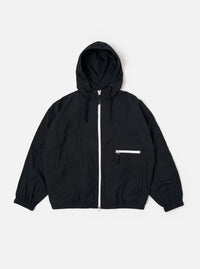 The Navy Cotton Recycled Nylon Mix Daley Jacket is shown as a flat lay against a white background. The jacket features a full-zip front, a drawstring hood, and two large slanted front pockets. The fabric has a smooth, matte finish.