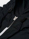 The Navy Cotton Recycled Nylon Mix Daley Jacket is presented as a flat lay against a plain white background. The image shows the back of the navy blue jacket, highlighting the hood, straight hem, and the functional construction of the cotton and recycled nylon blend fabric.