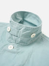 The Aqua Organic Fine Cord Duty Jacket is shown from the back as a flat lay against a plain white background. The image highlights the oversized fit, curved hem, and loose, darted sleeves of the garment. The fine corduroy texture of the organic cotton fabric is clearly visible.