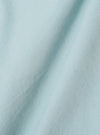 A close-up swatch image of the Aqua Organic Fine Cord Duty Jacket fabric shows the fine-ribbed corduroy texture in a bright aqua blue color. The image focuses on the detail of the organic cotton material, highlighting the consistent vertical lines of the cord.
