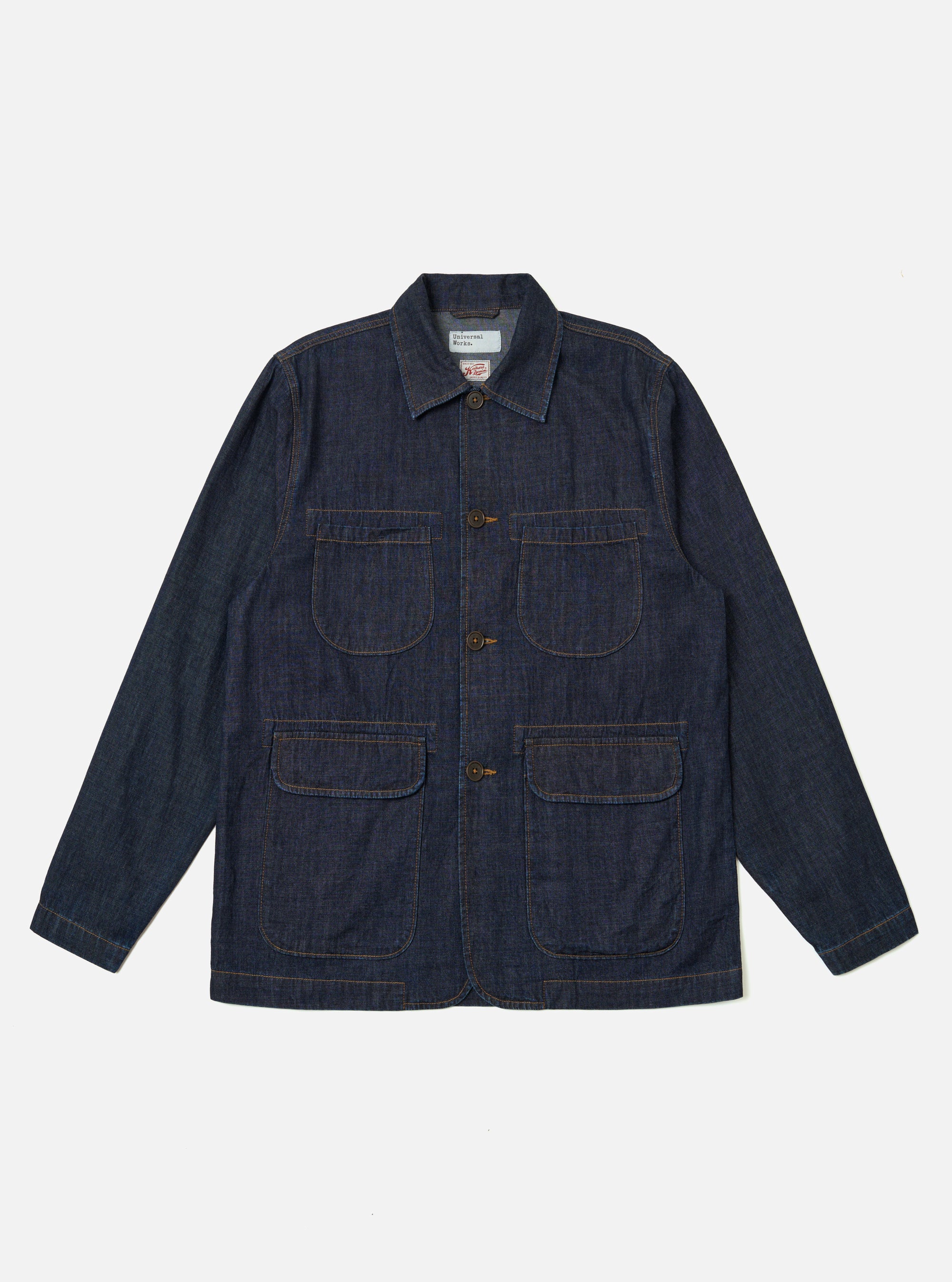 The Indigo Kaihara LT WT Denim Labour Jacket is shown as a flat lay against a plain white background. The jacket features a classic pointed collar, a central five-button closure, and four prominent front patch pockets, including one chest pocket with a buttoned flap and three open patch pockets. The indigo blue denim fabric has a uniform, dark wash.
