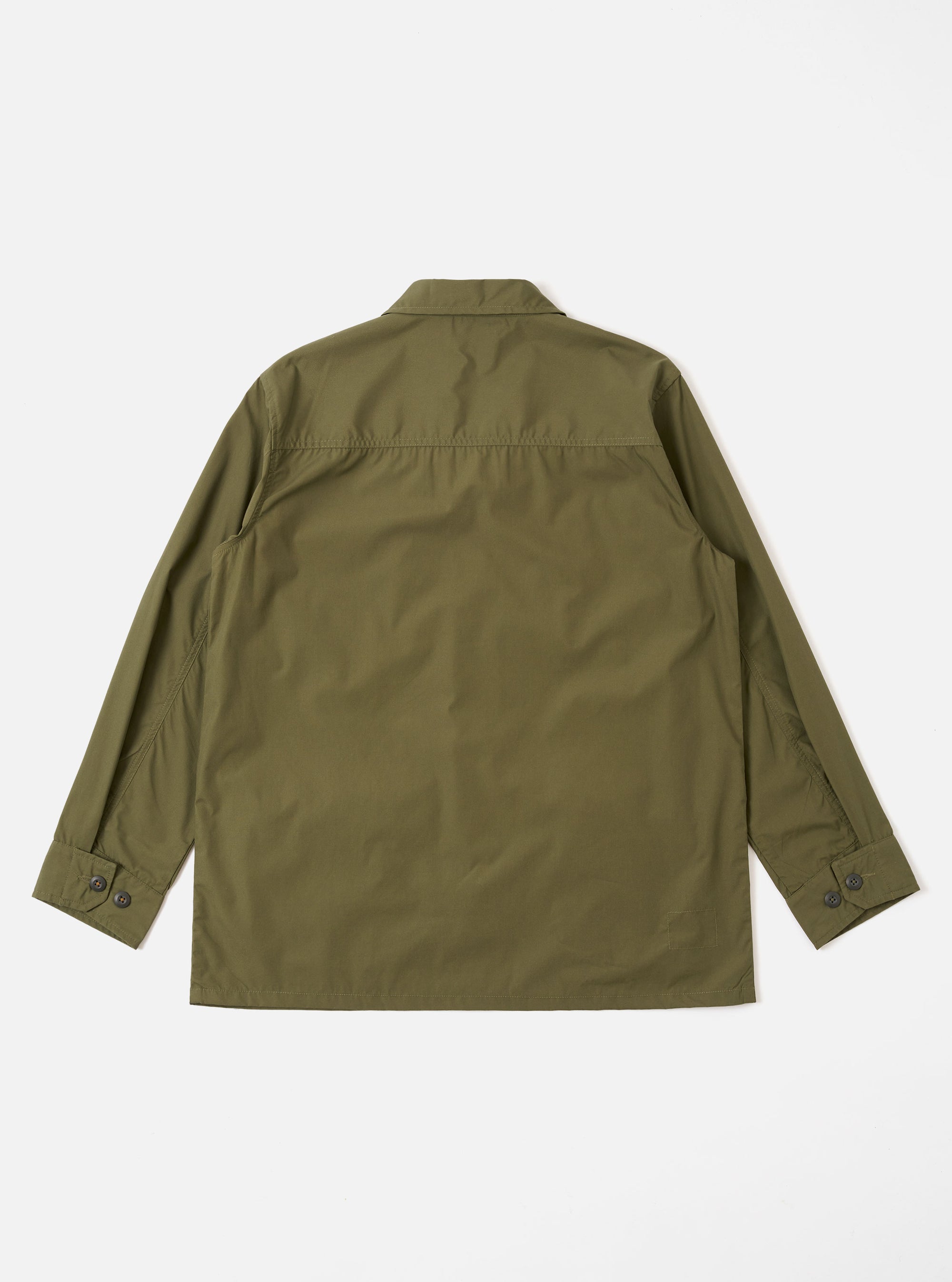 The Olive Recycled Polytech Jungle Jacket is shown from the back as a flat lay against a plain white background. The jacket features a prominent back yoke and an unstructured, loose fit.