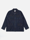 The Indigo Kaihara LT WT Denim Jungle Jacket is shown as a flat lay against a white background. The jacket features four large front patch pockets with flap closures, a central button-down front, and a structured collar. The garment is made from a dark indigo blue lightweight denim with visible stitching details throughout.