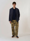 The Navy Peached Poplin Osaka Work Jacket is shown as a flat lay against a plain white background. The jacket features a kimono-style wrap front with internal and external tie closures, two chest patch pockets, and two lower patch pockets. The design includes visible contrast stitching throughout the navy blue peached poplin fabric.