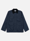 The Navy Recycled Polytech Parachute Field Jacket is shown as a flat lay against a white background. The jacket features a contrasting corduroy collar, a central button-down front, and four large 3D patch pockets with button flaps on the front. The fabric is a smooth, dark navy recycled polytech blend.