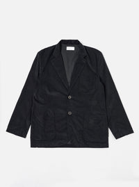 The Black Organic Fine Cord Two Button Jacket is shown as a flat lay against a white background. The jacket features a classic two-button front closure, a notch lapel, and two large patch pockets at the waist with a single chest patch pocket. The fine-wale organic cotton corduroy fabric provides a subtle vertical texture to the solid black garment.