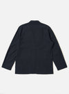 The Dark Navy Ospina Cotton Two Button Jacket is shown from the back as a flat lay against a plain white background. The image highlights the jacket's unstructured design, two-piece sleeves, and the subtle marl effect of the textured navy seersucker fabric.