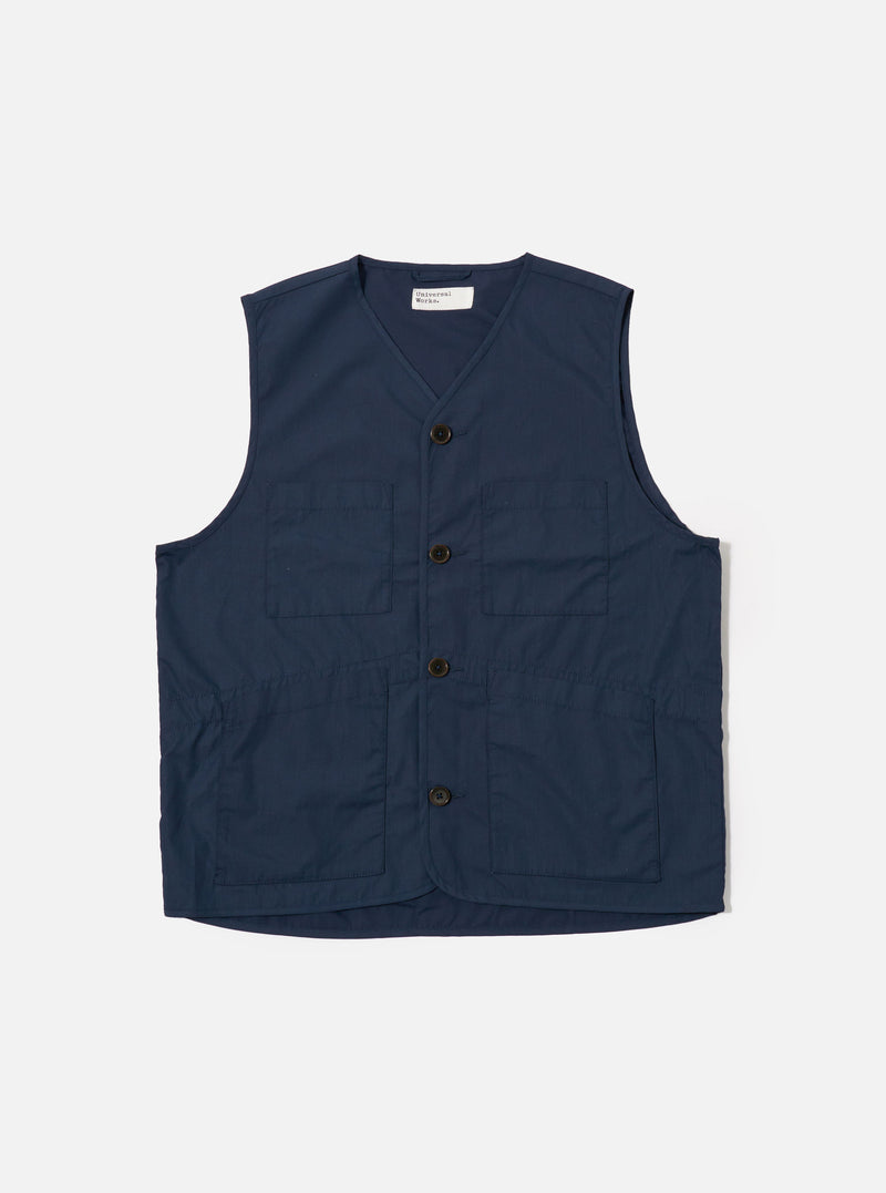 The Navy Recycled Polytech City Waistcoat is presented as a flat lay against a plain white background. The garment features a V-neckline, a five-button front closure, and three patch pockets, with one at the chest and two at the waist. The material is a smooth, dark navy recycled polytech fabric.