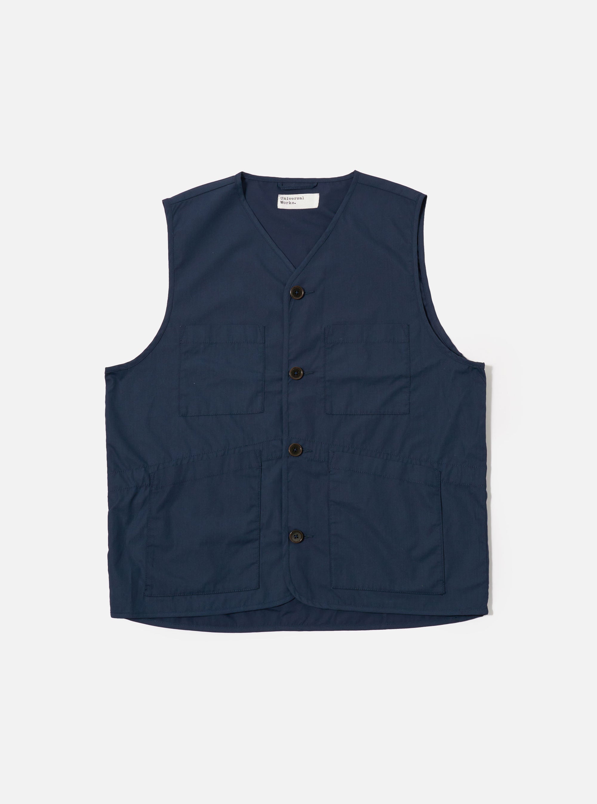 The Navy Recycled Polytech City Waistcoat is presented as a flat lay against a plain white background. The garment features a V-neckline, a five-button front closure, and three patch pockets, with one at the chest and two at the waist. The material is a smooth, dark navy recycled polytech fabric.