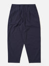 The Navy Peached Poplin Dutch Pant is shown as a flat lay against a white background. The trousers feature a loose, wide-leg fit with a drawstring elasticated waistband and two large front patch pockets. The peached poplin fabric has a smooth, matte finish.