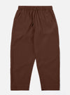 The Brown Peached Poplin Judo Pant is shown as a flat lay against a white background. The trousers feature a relaxed, straight-leg silhouette with an elasticated waistband and an integrated drawstring. Two front pockets and a subtle hanging loop on the waistband are visible. The brown cotton fabric has a soft, matte finish characteristic of peached poplin.