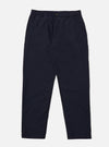 The Navy Tropical Suiting Military Chino is shown as a flat lay against a plain white background. The trousers feature a mid-rise, a button fly, and two front slanted pockets. The fabric is a smooth navy blue tropical suiting made from a wool and polyester blend.