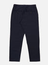 The Navy Tropical Suiting Military Chino is shown from a rear angle as a flat lay against a plain white background. The image highlights the two rear jetted pockets with button closures and the clean construction of the seat. The dark navy fabric, made from a polyester and wool blend, appears smooth and lightweight.