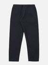 The Dark Navy Ospina Cotton Military Chino is shown as a flat lay against a white background. The trousers feature a regular, tapered leg, a button fly fastening, and two front slanted pockets. The dark navy fabric has a visible puckered seersucker texture.