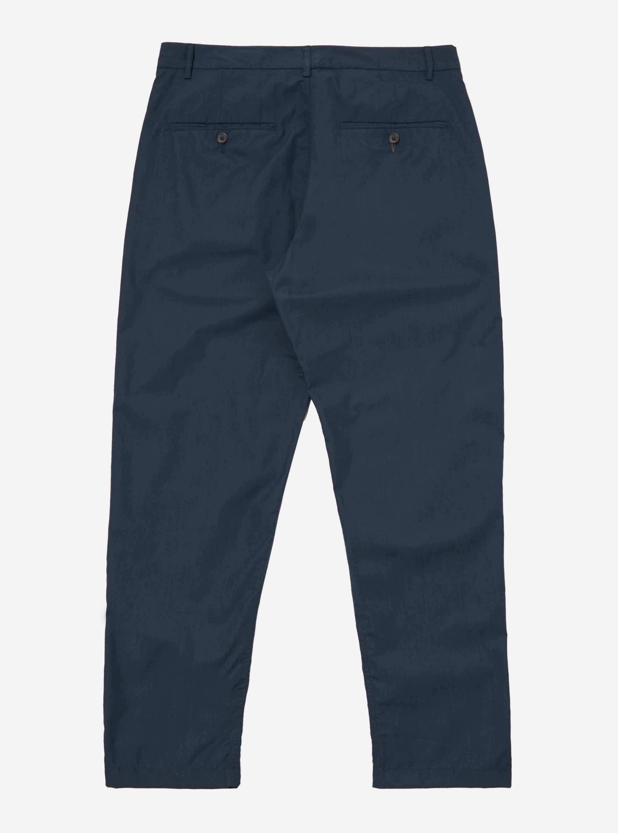 The Navy Recycled Polytech Military Chino is shown from the rear as a flat lay against a plain white background. The image highlights the two rear jetted pockets with button closures and a clean, straight waistband. The dark navy fabric has a smooth, technical finish.