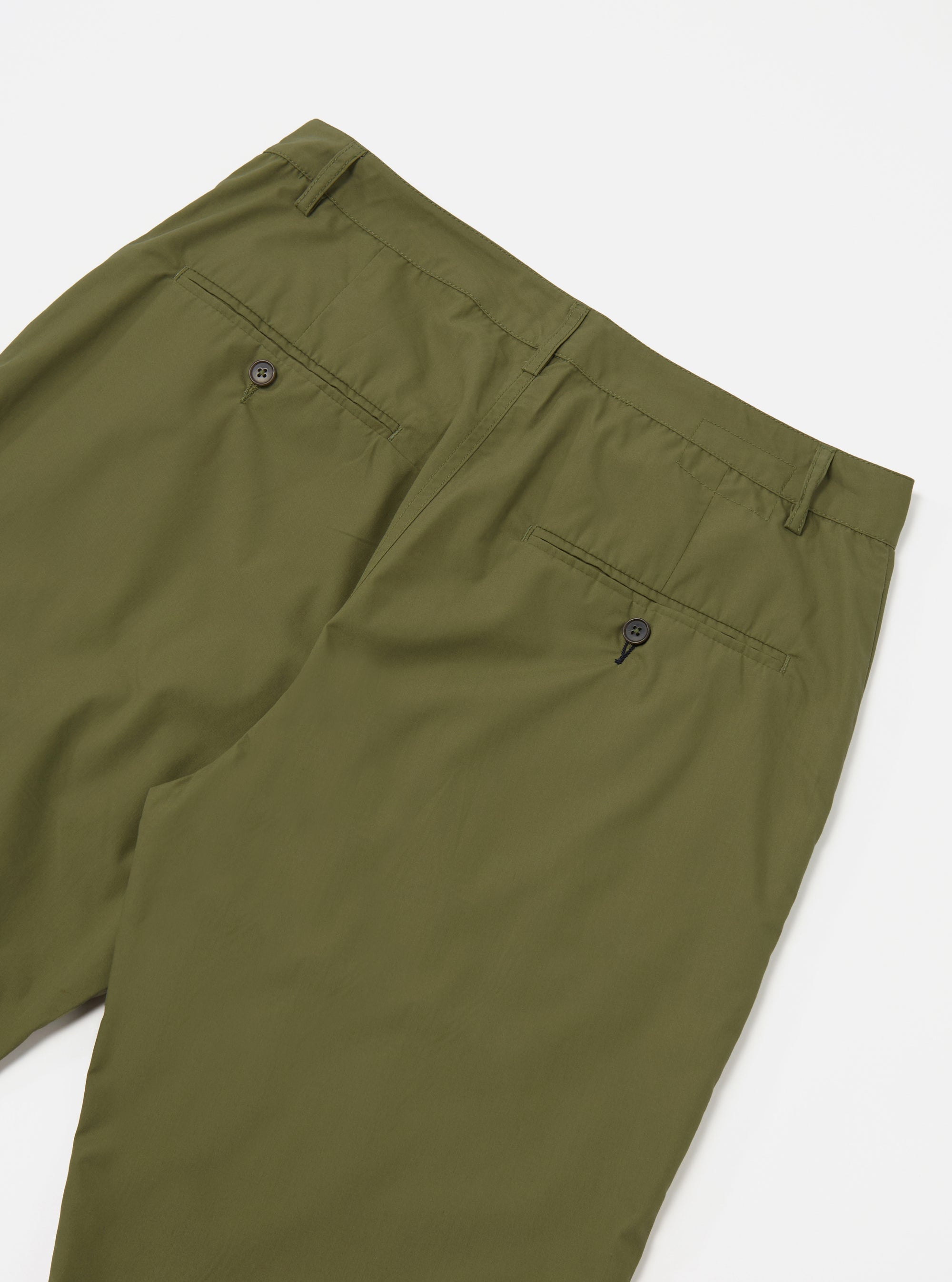 The Olive Recycled Polytech Military Chino is shown from the back as a flat lay against a plain white background. The image highlights the two rear welt pockets, with a button closure on the right pocket, and the clean construction of the waistband. The olive green fabric has a smooth, technical finish.