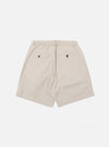 The Brown Kennedy Stripe Pleated Track Short is shown from the back as a flat lay against a plain white background. The image highlights the rear construction, featuring one button-down flap pocket on the right side and a simple welt pocket on the left. The fabric displays a brown and cream vertical stripe pattern throughout.